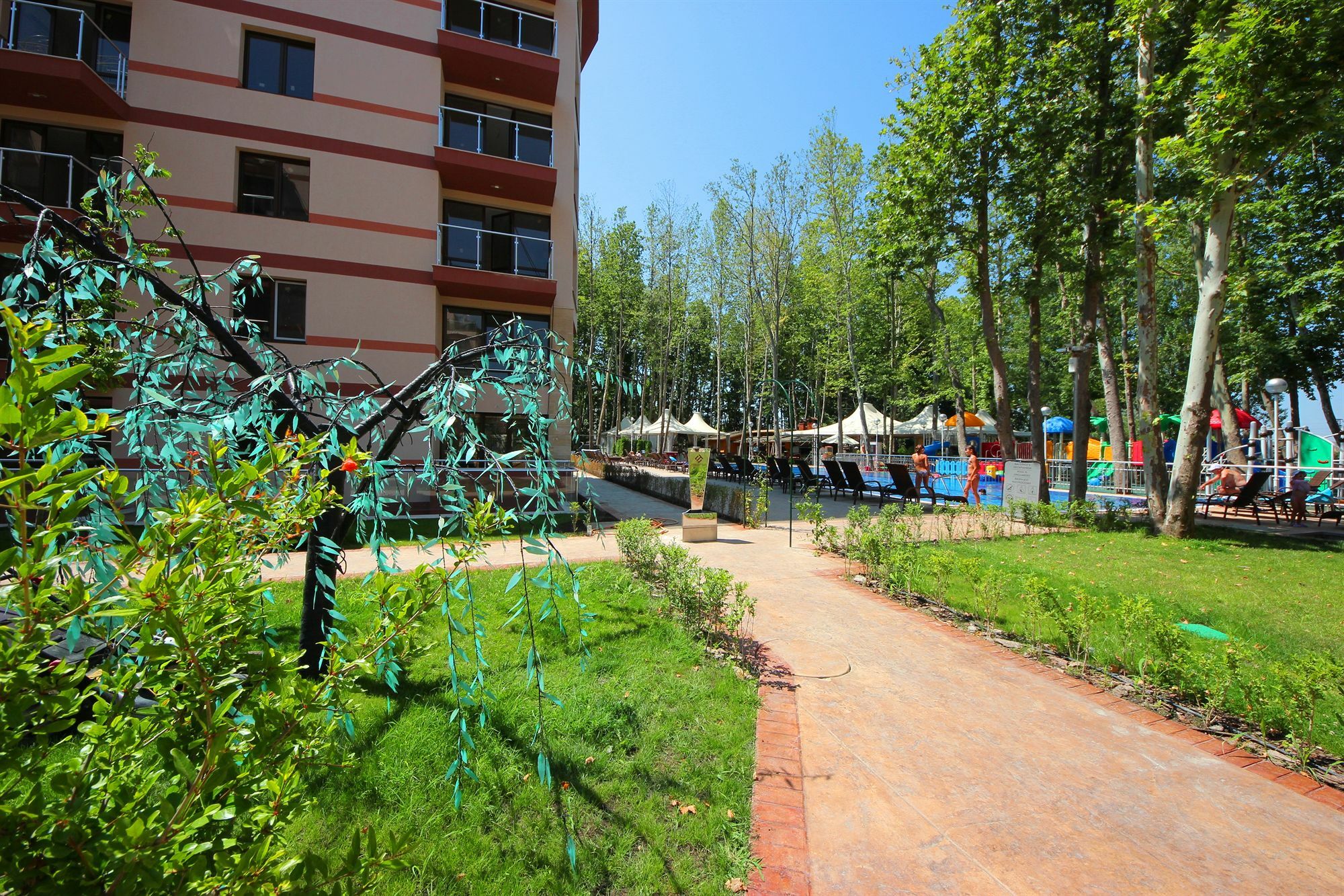 Menada Tarsis Apartments Pantai Sunny Bagian luar foto